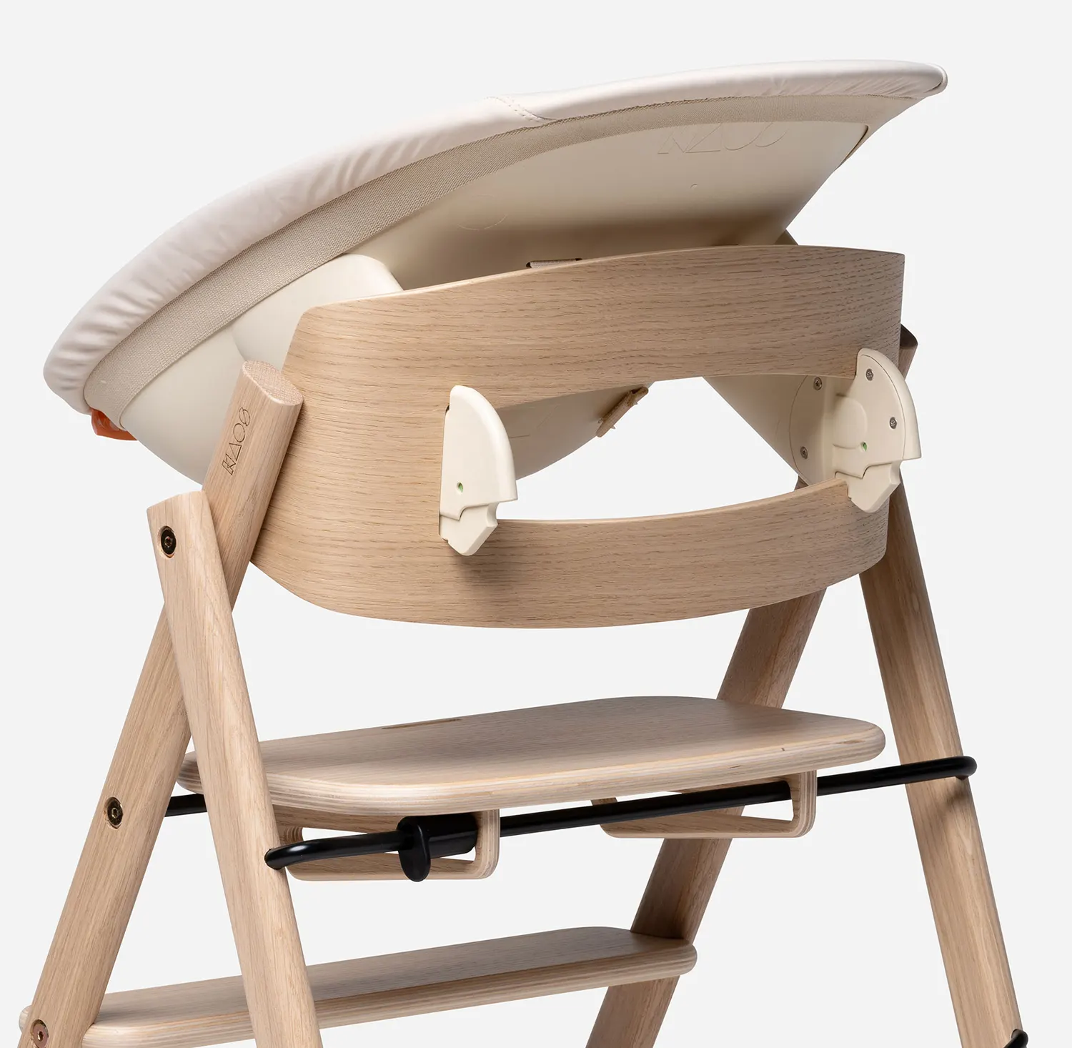 Kaos Babysitz ivory auf Hochstuhl Rueckseite