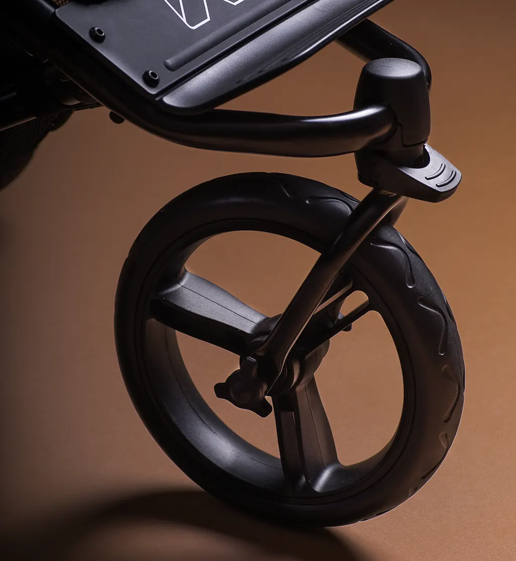 Mountain Buggy Swift stroller front wheel detail