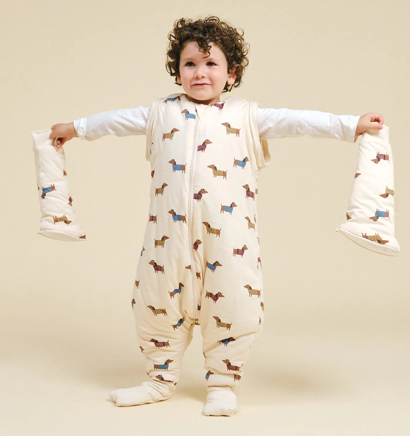 Molis&Co Babyschlafsack Tog 2,5  mit Ärmeln und rutschfesten Socken Fancy Teckels mit abnehmbaren Ärmeln