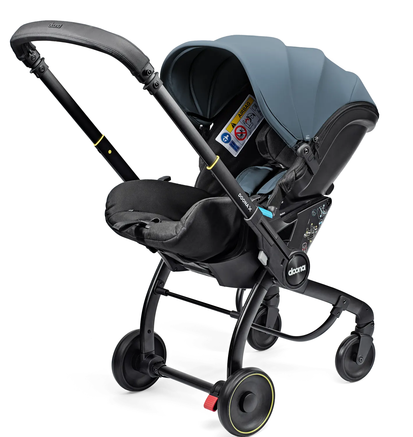 Doona X Babyschale Ocean Blue in Kinderwagen‑Modus unterwegs